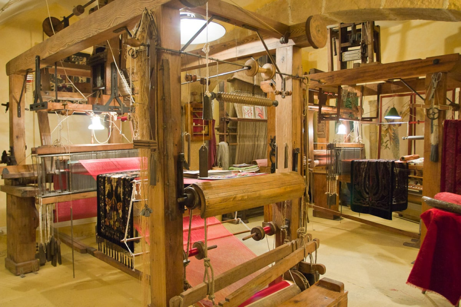 This workshop, one of the few left in Lyon, uses 19th-century hand looms