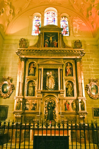 A 16th-century alterpiece in the Spanish style (heavy and more formal).