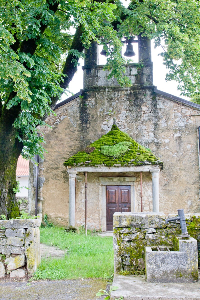 A moss-covered country church near Skocjan Caves