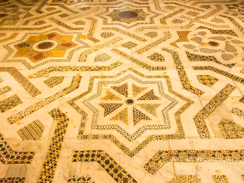 The floor is covered in intricate mosaics too