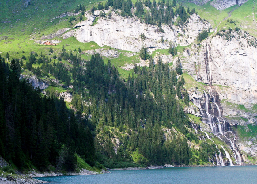 Oeschinensee is ringed by about a dozen waterfalls of various shapes and sizes. The roar of falling water can be heard all around the lake (along with cow bells).
