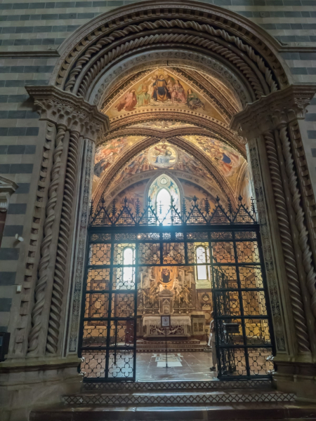 Entrance to one of the elaborately painted side chapels of the cathedral