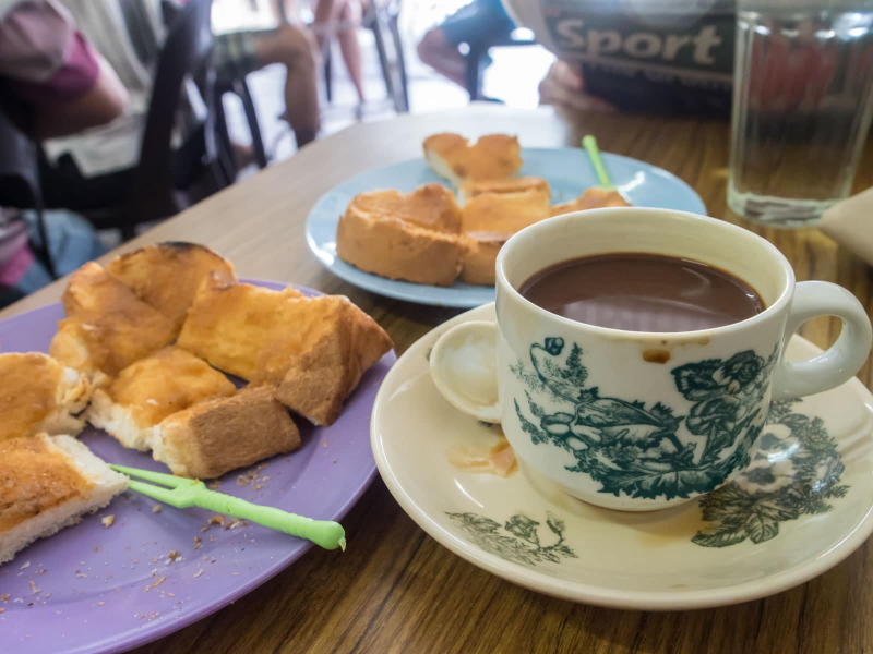 The coffee (which is fantastic, Melissa says) is typically served with toast spread with coconut jam