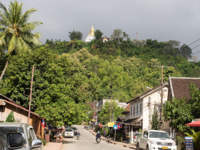 100-foot-high Phousi hill dominates downtown Luang Prabang. We could see the golden stupa on top from the bedroom window of our first guesthouse.