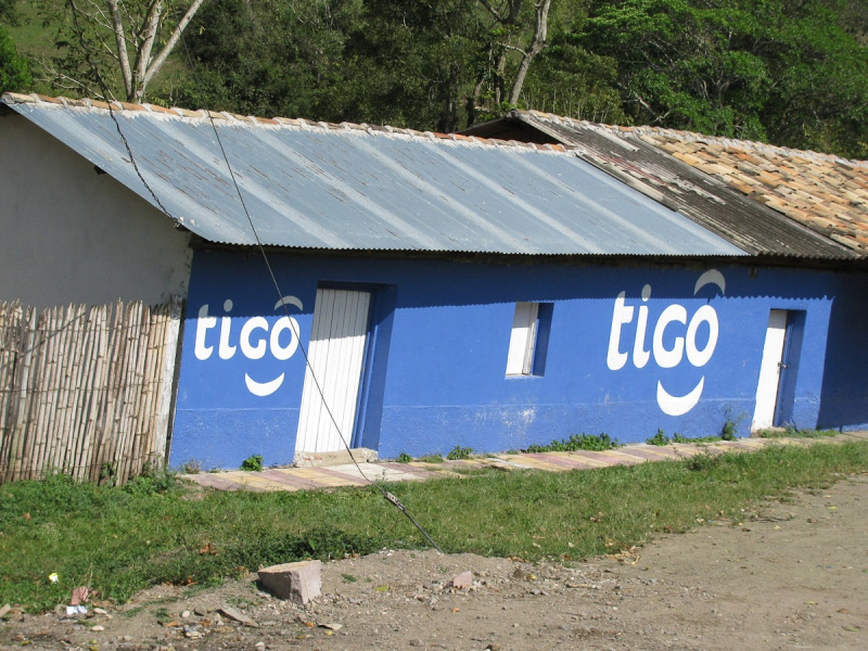 Tigo, a Honduran phone company, must offer to paint buildings in exchange for advertising; their logo is everywhere