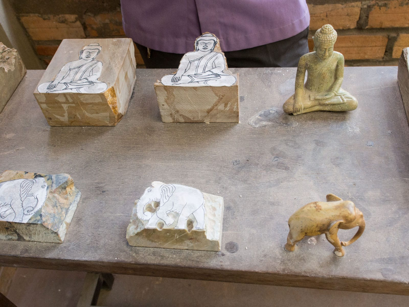 Stages of carving in soapstone