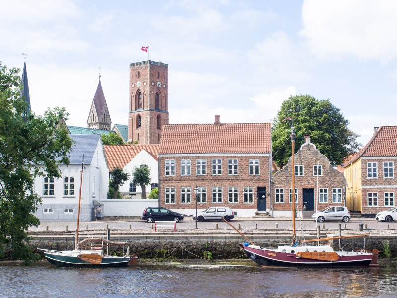 The view from Ribe's riverfront wharf to the 1333 Commoner's Tower on the cathedral 