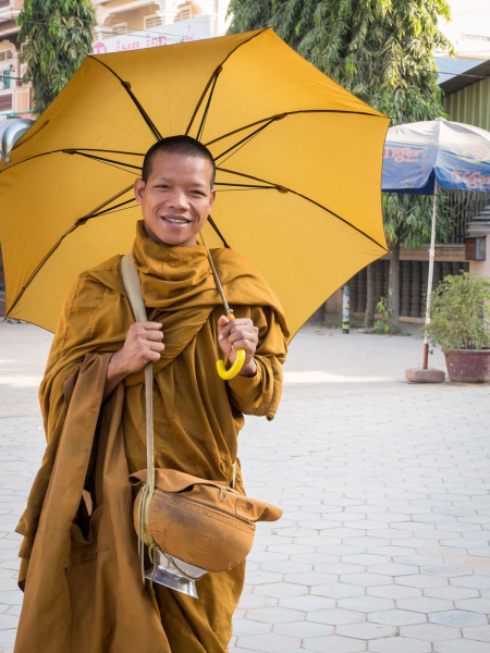 Monks are the only people who carry umbrellas of this particular mustard-brown color (a tourist trying to buy one will be quickly dissuaded)