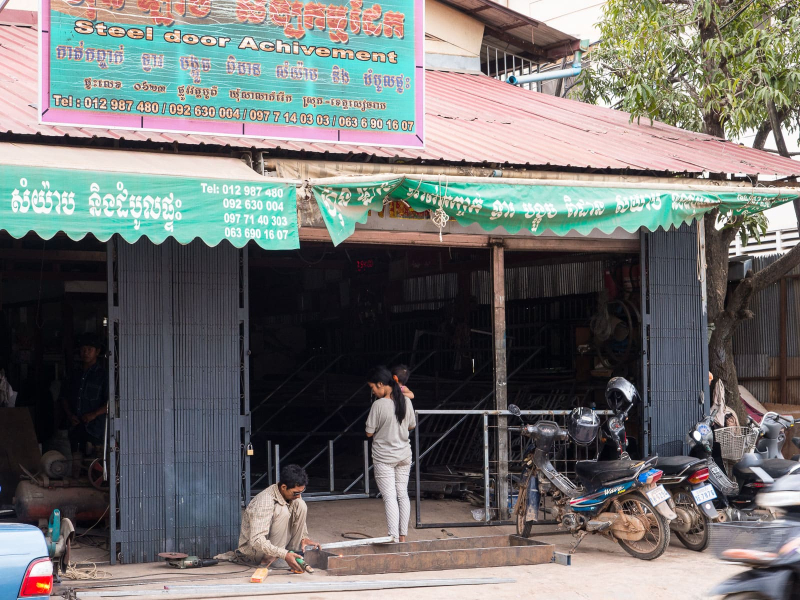 Scenes from our street (Wat Bo Road) in Siem Reap: the Steel Door Achievement store