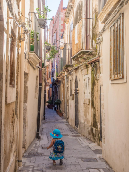 Francesca heads down the narrow lane where we stayed, in the oldest part of Syracuse, Ortigia
