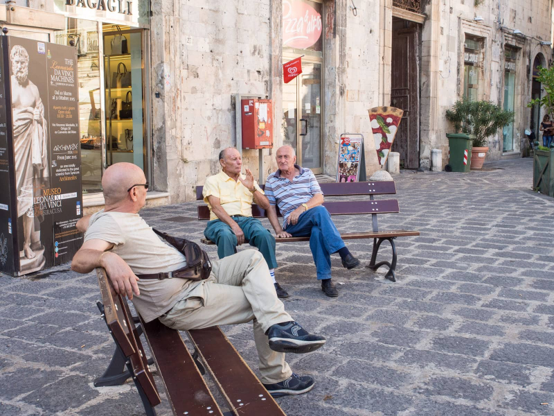 Everywhere we went in Sicily, we saw older men sitting on benches