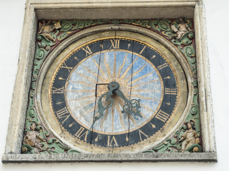 A clock on the outside of the Church of the Holy Spirit made in the late 1600s