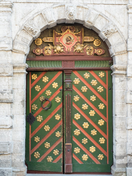 The door of the Brotherhood of the Blackheads guildhouse, named for their patron saint, Egyptian St. Maurice