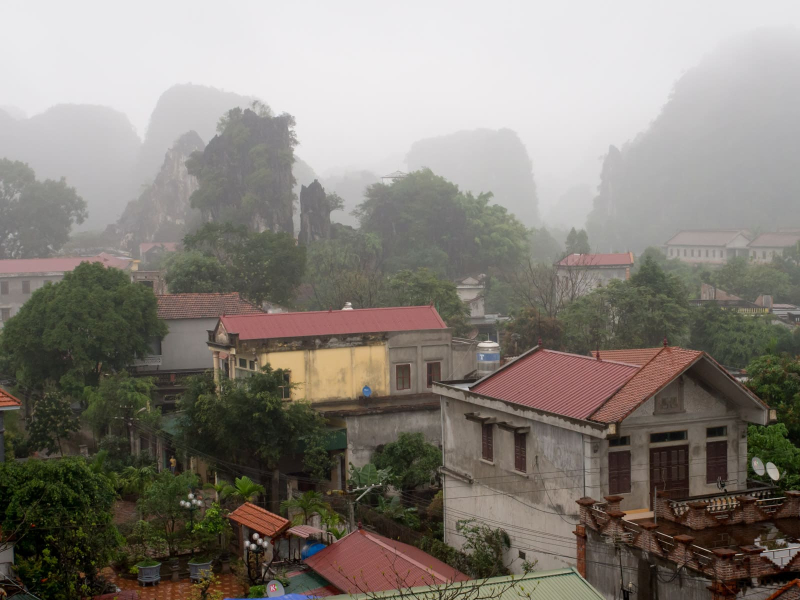 The view from our hotel of the misty mountains around Tam Coc