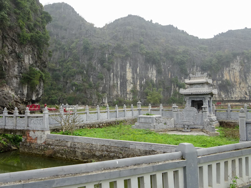 A cemetary in the shadow of the limestone hills that dot Tam Coc