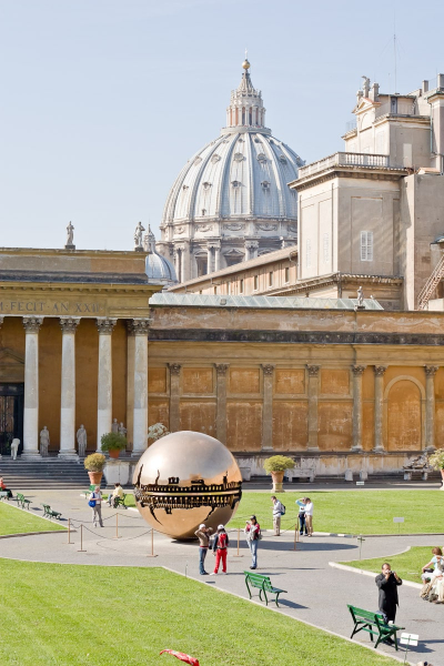 Courtyard of the Vatican Museums, with the dome of St. Peter's in the background
