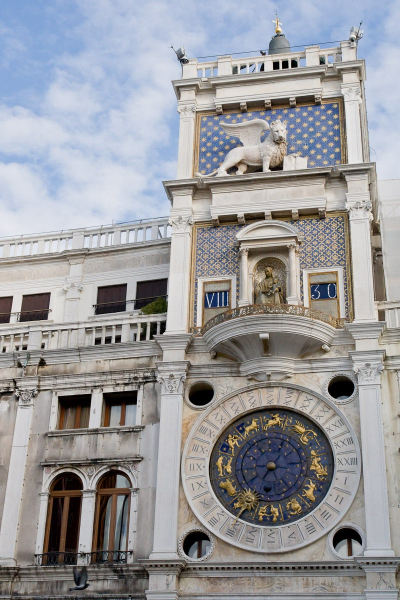The 1506 Torre dell'Orologio still keeps time (shown here at 8:30 a.m.)