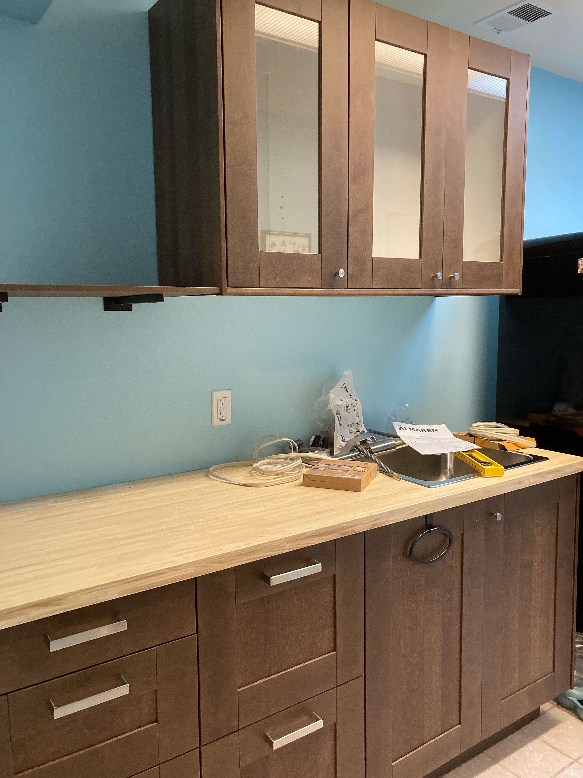 Brown kitchen cabinets and counter