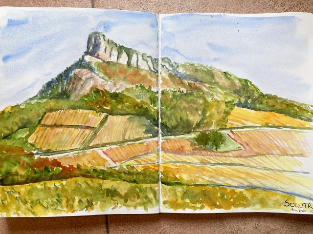 Watercolor of autumn vineyards and Solutre cliff