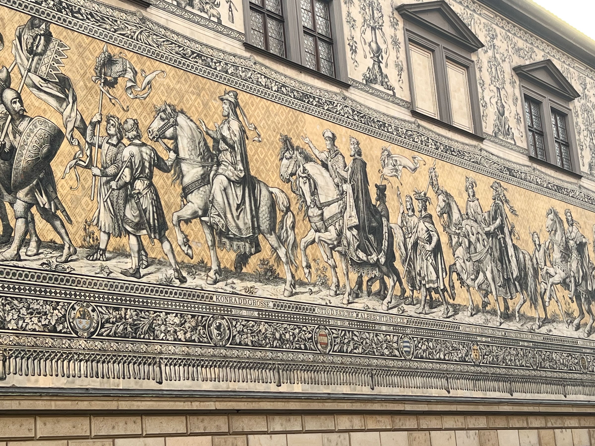 A mosaic mural of porcelein tiles showing Saxon rulers through the ages