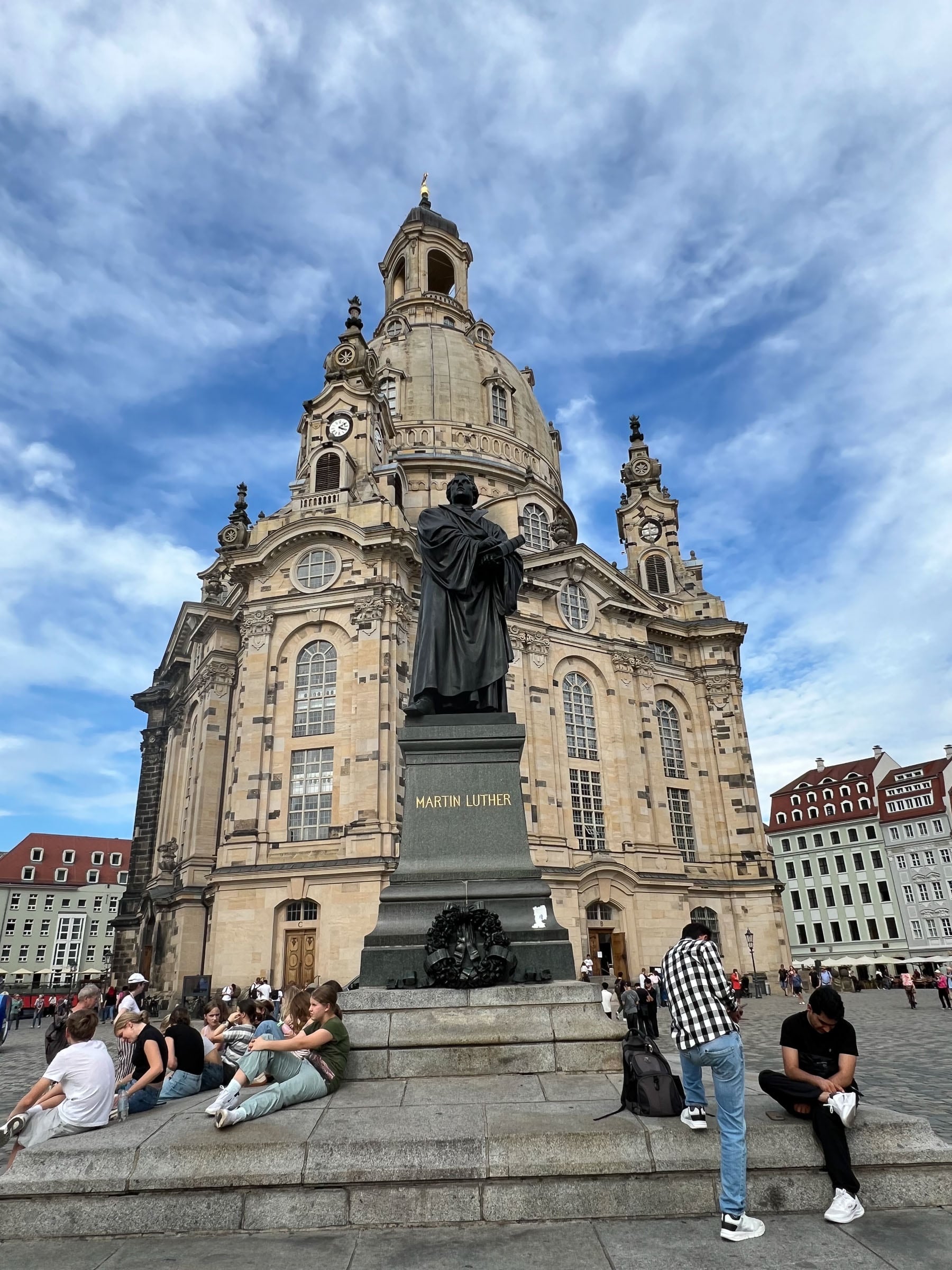 A statue of Martin Luther in front of the church, which is Lutheran